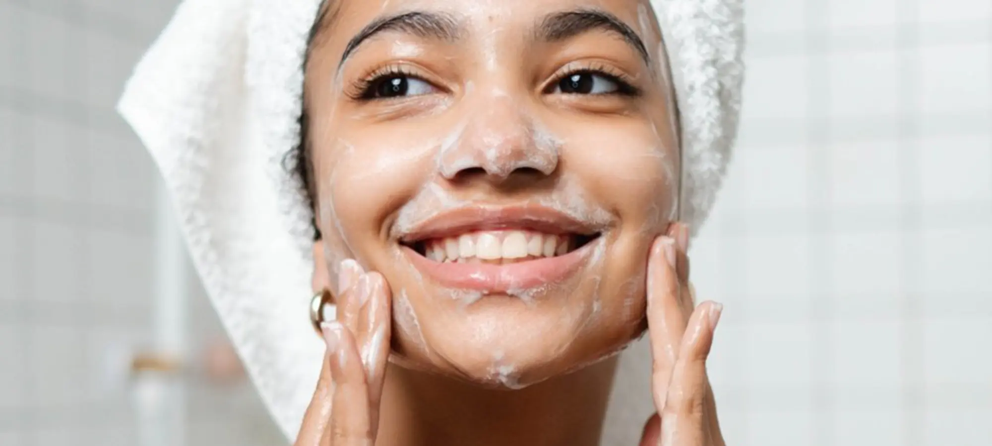 Lady Using Face Wash PMD Consultancy